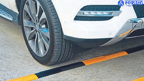 Rumbler strip on concrete road.
