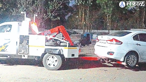 A four-wheeler towed by the city transport department.