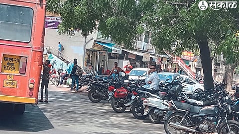 Bikes parked in the bus stand area.