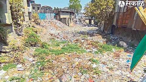 Plastic waste piled up in drains.