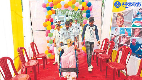 Students of 'Raseyo' of Kisan College taking the differently abled to vote.