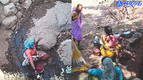 Tribal women filling water at the spring in the sun.