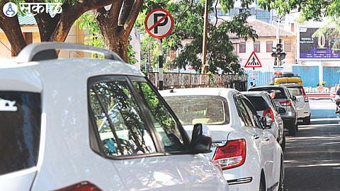 Even though there are no parking signs on the road, there are many four-wheelers parked on the road.