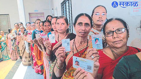 Essential service personnel queuing up to vote.