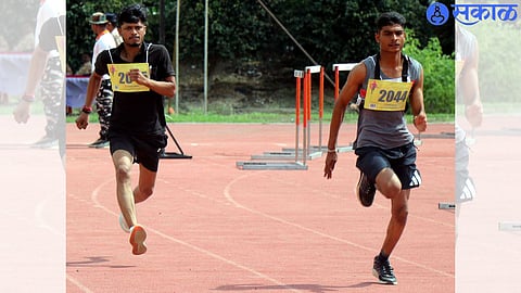 Candidates running in field test in Police Recruitment conducted by City Police Commissionerate at Minatai Thackeray Maidan.