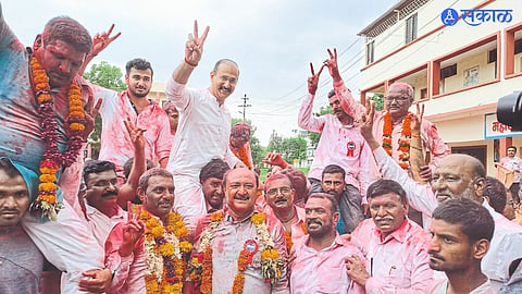 MLA Kunal Patil along with the winning candidates and activists cheering after the resounding victory of the Jawahar panel in the Co-operative Trading and Processing Society elections.