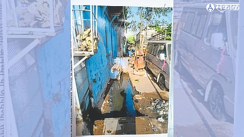 Prof. Tasha Galli in Dhule city. Dr. Clogged drain in front of Salim Ansari's house.