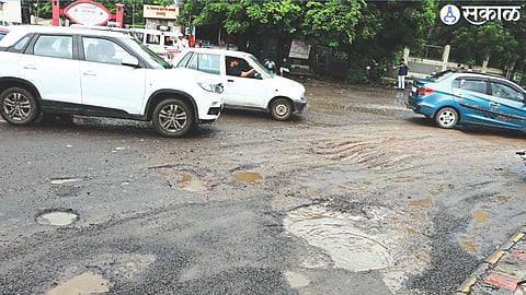 Potholes at Akashwani Chowk on the highway passing through Jalgaon city.