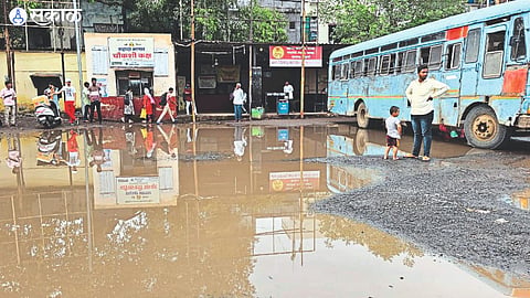 Water puddles in the bus stand area