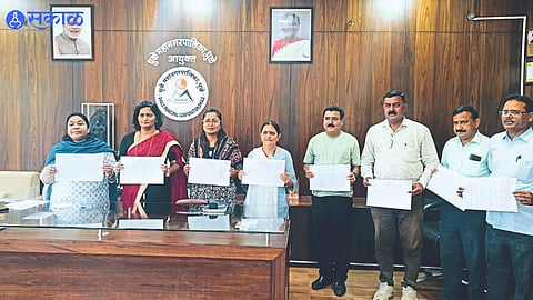 Municipal Commissioner Amita Dagade-Patil and other officials releasing the provisional third list of beneficiaries of Chief Minister Majhi Ladki Bahin Yojana.