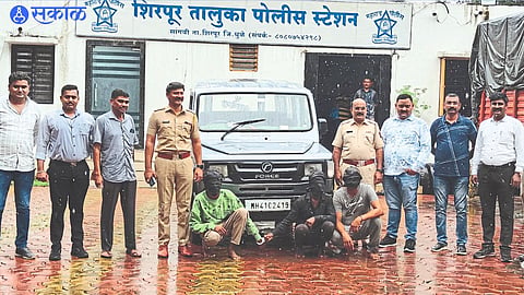 Police Inspector Jaipal Hire and colleagues with the suspect and the crime vehicle.