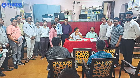 Officials while deciding cases in Shahada Lok Yataka.