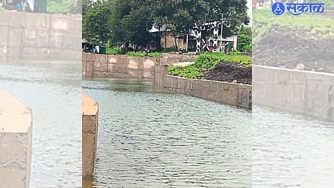 A railway underpass filled with water during a rain