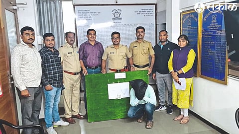 Officials, staff of Mumbai Naka Police Station with the suspected jewel thief along with the jewels seized from him.