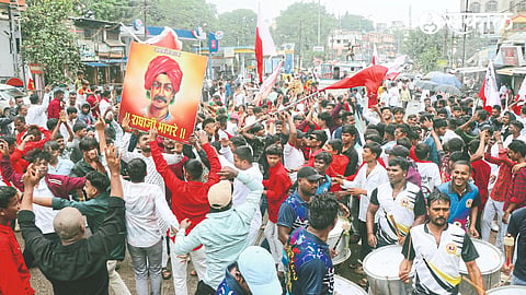 Youths participating in the procession held on the occasion of World Tribal Day.