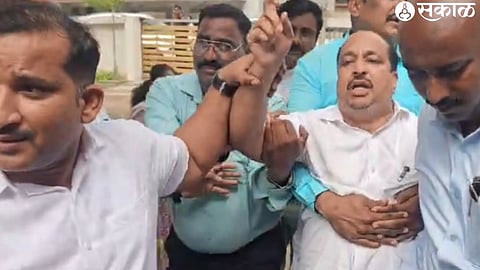 City police team detaining social worker Gaju Ghodke as part of preventive action.