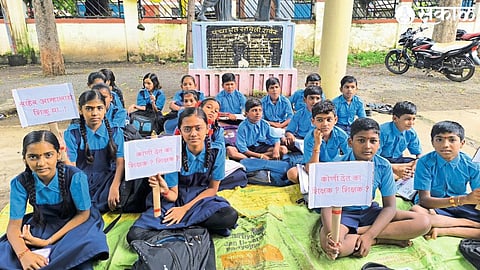 Sarpanch Shubham Patil while teaching a class of students in Therola in Panchayat Samiti premises.