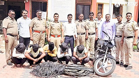 A police team present during the investigation along with the copper cable theft gang