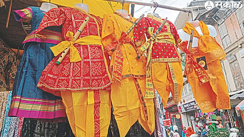 Traditional dresses on sale in the market on the occasion of Krishna Janmashtami