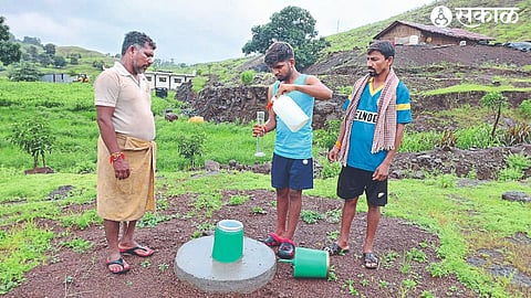 Villagers measuring rainfall through operational rain gauges at Katri.