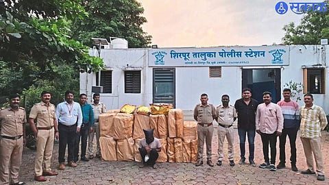 Police inspector Jaipal Hare and his colleagues while inspecting the seized gutkha.