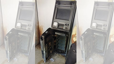 cutting ATM with a gas cutter