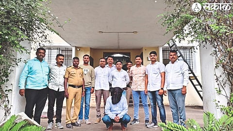 A police officer with the accused who pretended to be a policeman.