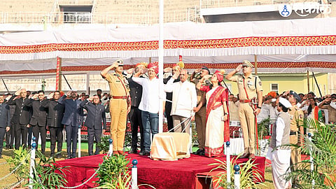  Minister Abitkar addressing the crowd during the Republic Day celebrations at Shahu Stadium, emphasizing his commitment to district development.