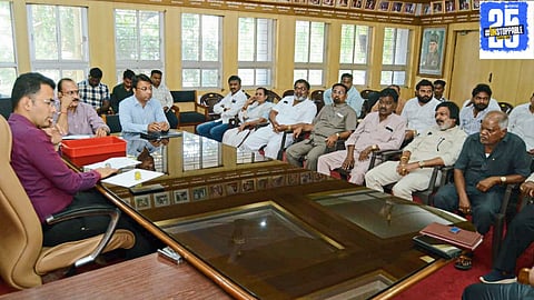 Civic officials reviewing the Ambedkar Jayanti procession route during a preparatory meeting held at the municipal headquarters.