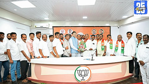 Atul Bhosale welcomes the Chande uncle-nephew duo from Malakapur into BJP during an event in Mumbai, signaling a shift in local political dynamics.