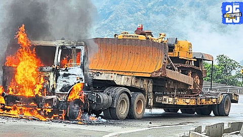 Massive fire in container at Karul Ghat disrupts traffic for hours; emergency response underway.
