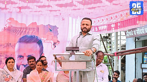 Jaykumar Gore addressing villagers during a visit to Uttar Maan, promising water in 2.5 years