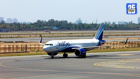 Security personnel surround the Cochin-Delhi flight after an emergency landing at Nagpur Airport following a bomb threat; passengers safely evacuated.

