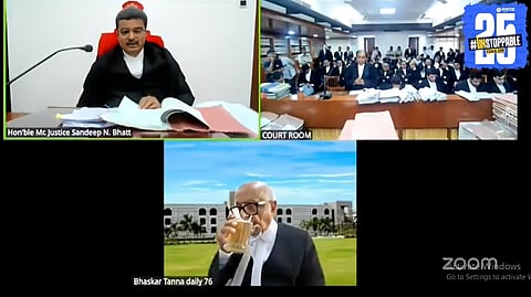 Senior Advocate Bhaskar Tanna seen allegedly consuming beer and talking on the phone during a virtual session of the Gujarat High Court
