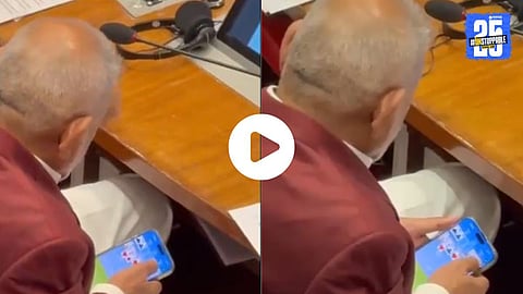 Agriculture Minister Manikrao Kokate seen allegedly playing a game of Rummy inside the Maharashtra Assembly, as claimed by MLA Rohit Pawar in a viral tweet criticizing government inaction amid ongoing farmer suicides.

