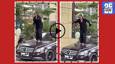A girl stands on a moving Mercedes bonnet performing an ‘Aura Farming’ dance in Mumbai, sparking viral reactions and safety concerns.

