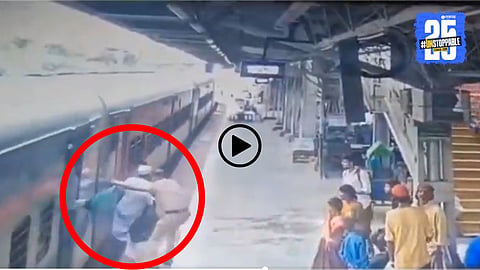 RPF officer Pandurang Chavan pulling a passenger away from the gap between the moving train and platform at Pune Railway Station — caught on CCTV.