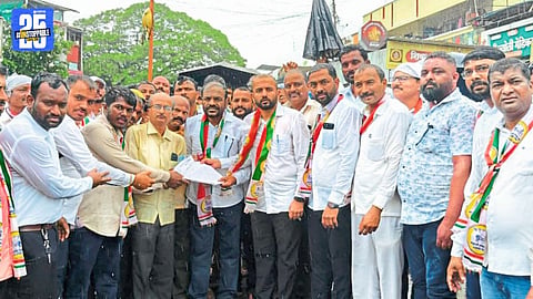 NCP workers protesting in Shedgewadi, Shirala taluka, against substandard road construction.
