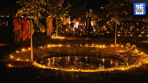 Vaduj’s Oxygen Park glows with 400 eco-friendly water lamps during a sustainable Diwali celebration, inspiring community awareness.