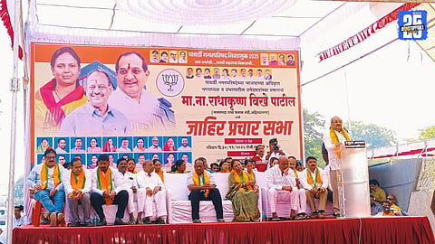Guardian Minister Radhakrishna Vikhe Patil addressing a public gathering during the election campaign.