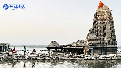 Ancient Marvel Rises from the Waters: Palasnath Temple Draws Visitors as Reservoir Shrinks