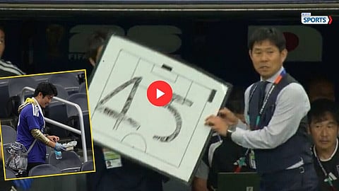 Hajime Moriyasu uses board during Japan vs Netherlands match