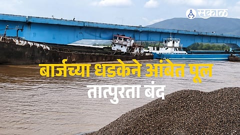 Ambet Bridge was temporarily closed after two barges drifting in the flooded Savitri River struck the structure.