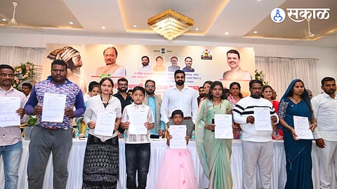 Dignitaries distribute government certificates to citizens and students at the Samadhan Camp in Theur.
