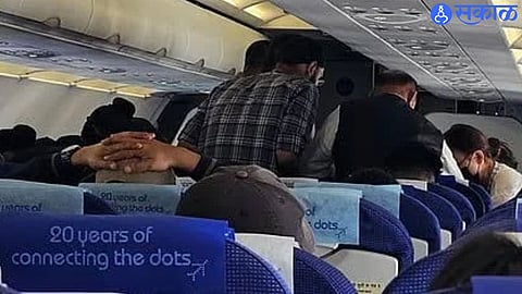 Dr. Bhagwat Karad provided emergency medical assistance to a woman passenger during an IndiGo flight to Aizawl.