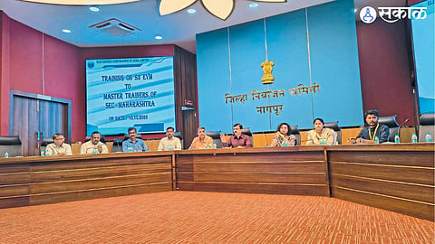 Election officials and staff attend training in Nagpur on the operation of new S-3 electronic voting machines and the EMS management system.