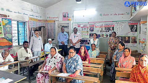 Seventy-three-year-old Rama Dabhade takes the ULLAS literacy examination at Wadgaon Kolhati in Chhatrapati Sambhajinagar district.