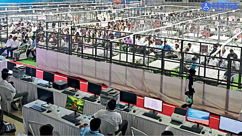 Officials prepare for vote counting in the Nagpur Graduate Constituency election at Mankapur Sports Complex.