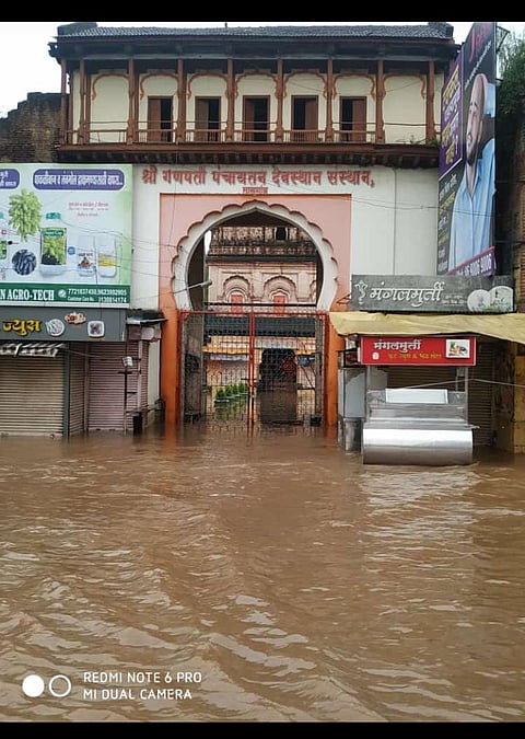 Water at the historic Ganapati temple in Tasgaon; 
