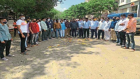 Nationalist Youth Congress agitation by lighting lamps in potholes nashik marathi news